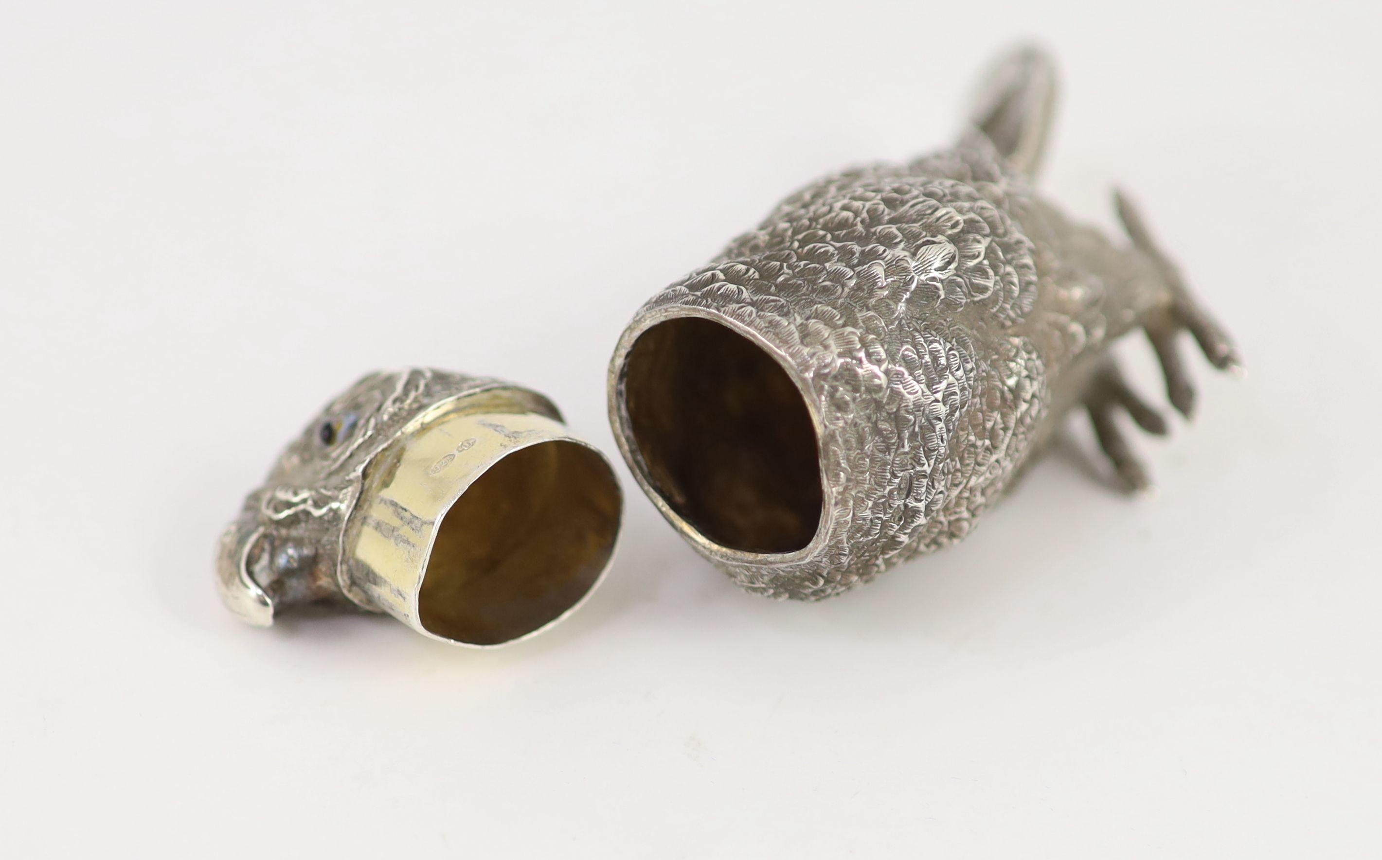 A late 19th century Hanau novelty silver pepperette, modelled as a parrot